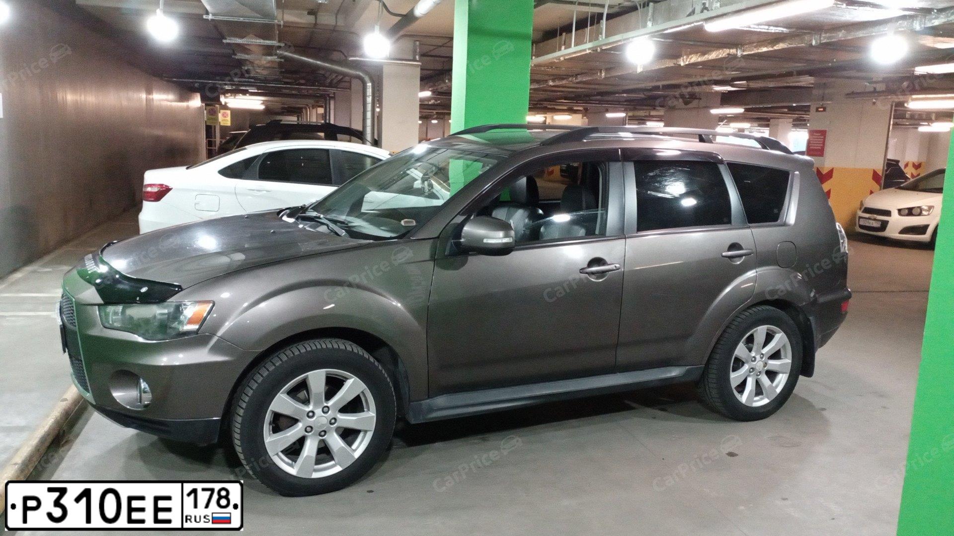 Фото автомобиля MITSUBISHI OUTLANDER, 2010 — госномер Н400ОА98. Цвет: Коричневый