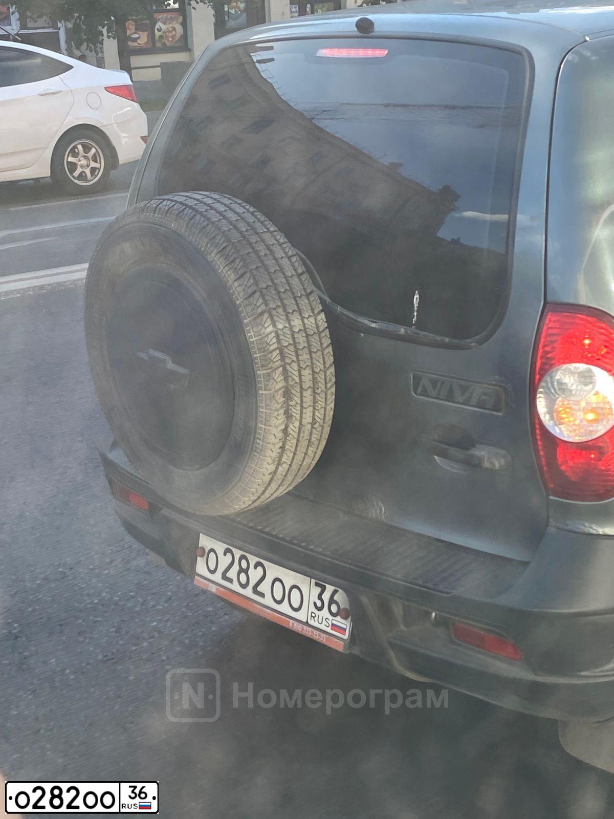 Фото автомобиля GAZ 3110 WOLGA, 2001 — госномер Е414СК36. Цвет: БЕЛЫЙ