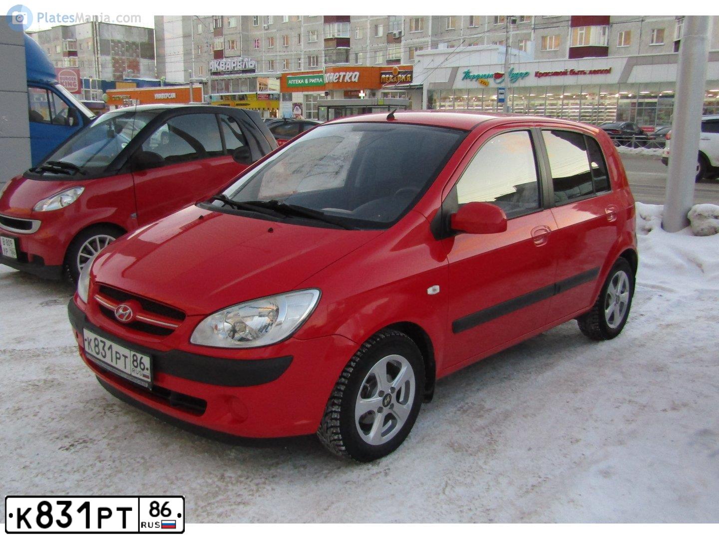 Фото автомобиля HYUNDAI GETZ, 2007 — госномер К831РТ86. Цвет: Красный