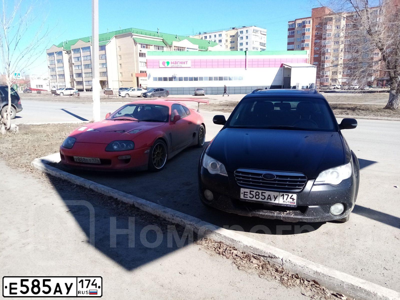 Фото автомобиля SUBARU OUTBACK, 2007 — госномер Е585АУ174. Цвет: ЧЕРНЫЙ