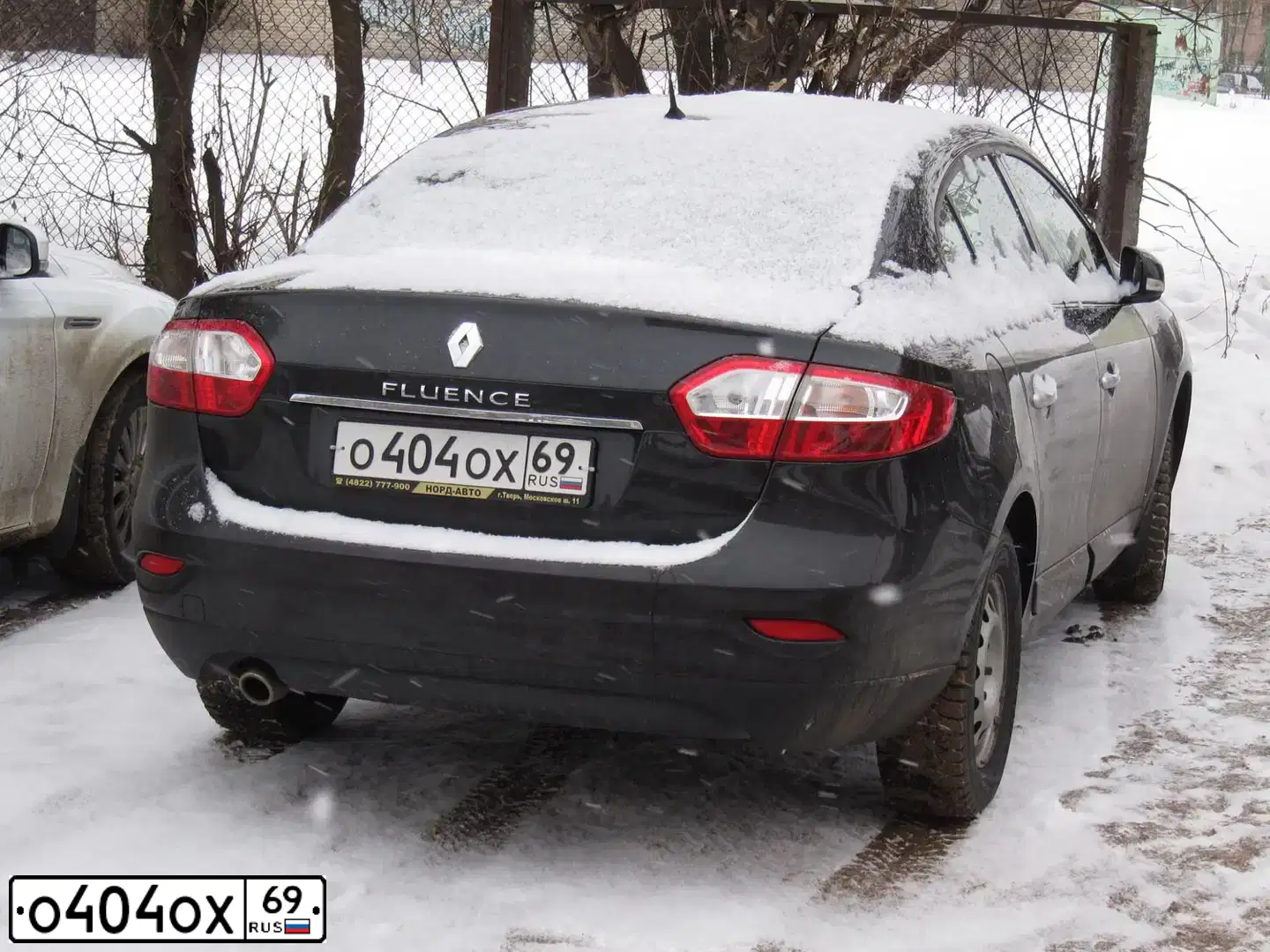 Фото автомобиля RENAULT FLUENCE, 2012 — госномер О404ОХ69. Цвет: ЧЕРНЫЙ