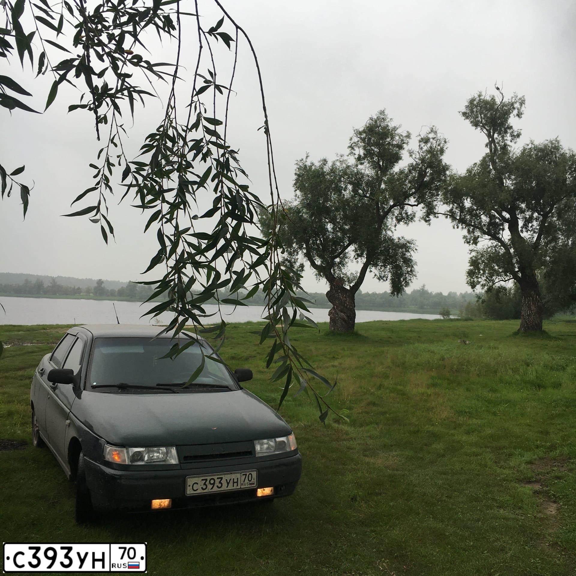 Фото автомобиля LADA 2110 LADA, 2004 — госномер С393УН70. Цвет: Темно-зеленый