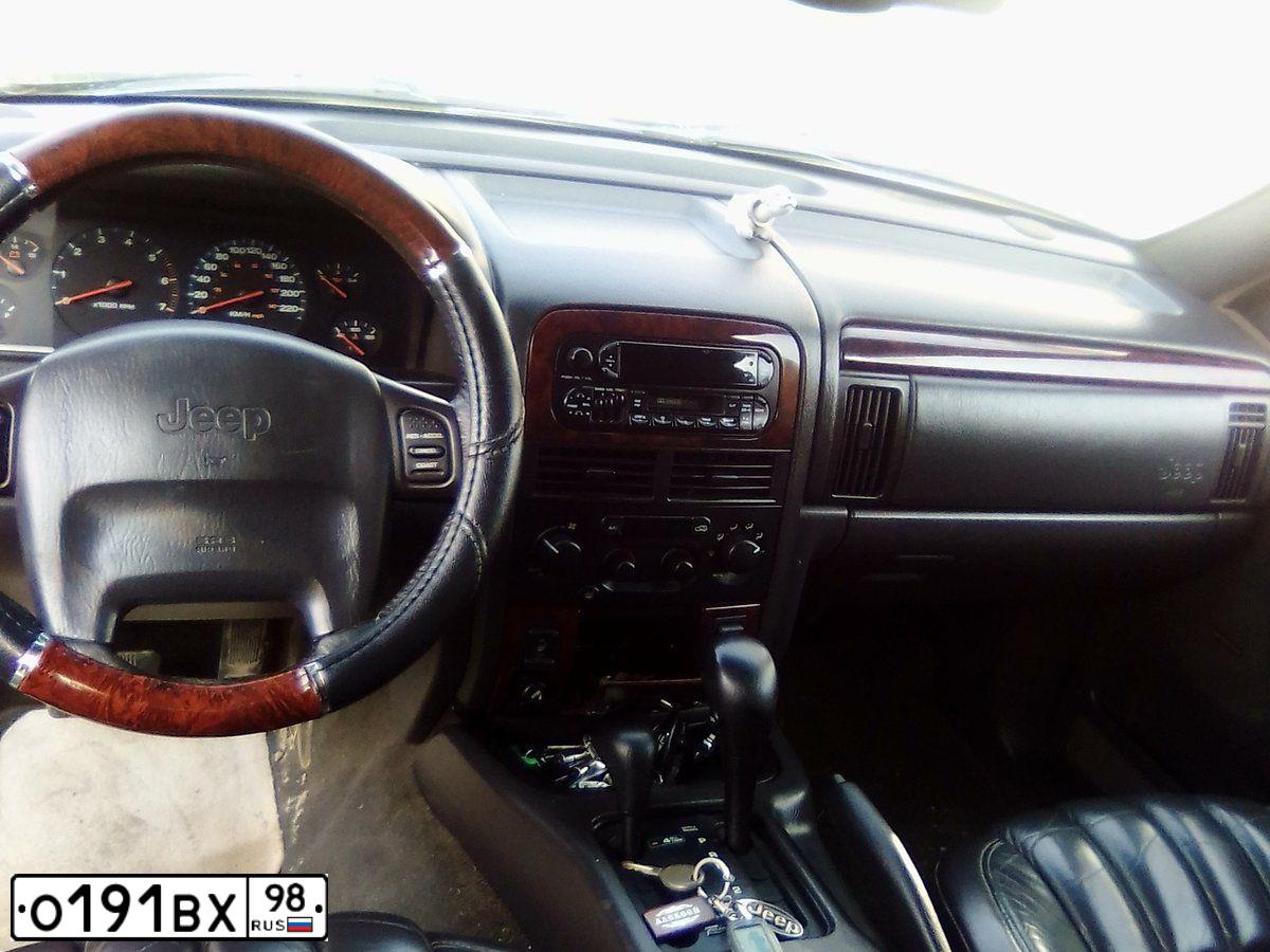 Фото автомобиля JEEP GRAND CHEROKEE, 2000 — госномер О191ВХ98. Цвет: ЧЕРНЫЙ