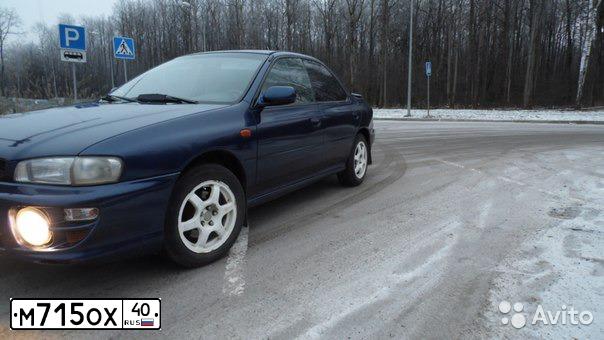 Фото автомобиля SUBARU IMPREZA, 1997 — госномер Е779МХ136. Цвет: синий