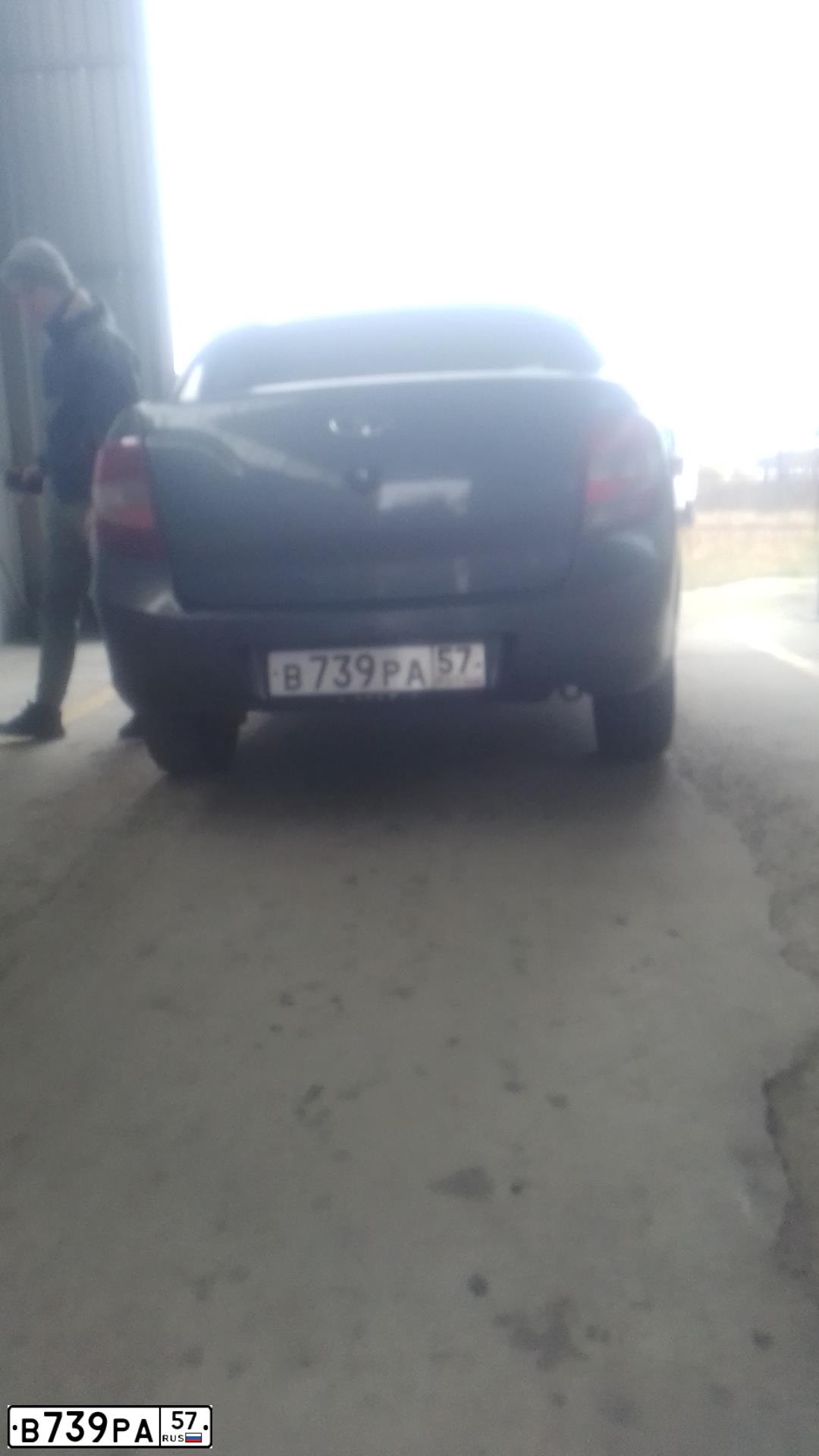 Фото автомобиля LADA 2190 GRANTA, 2014 — госномер У588ОА71. Цвет: серебристо-темно-серый