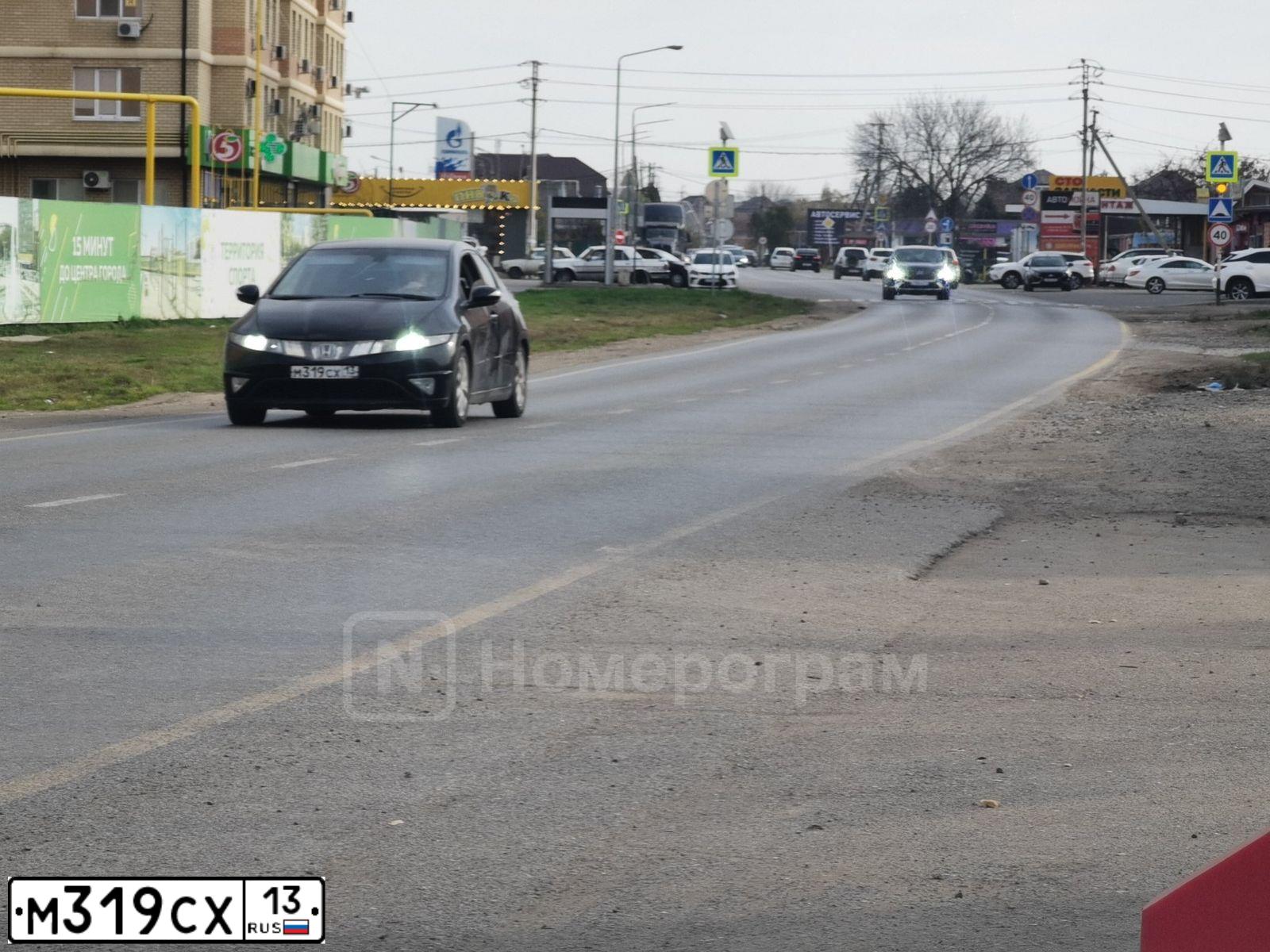 Фото автомобиля HONDA CIVIC, 2008 — госномер М319СХ13. Цвет: ЧЕРНЫЙ