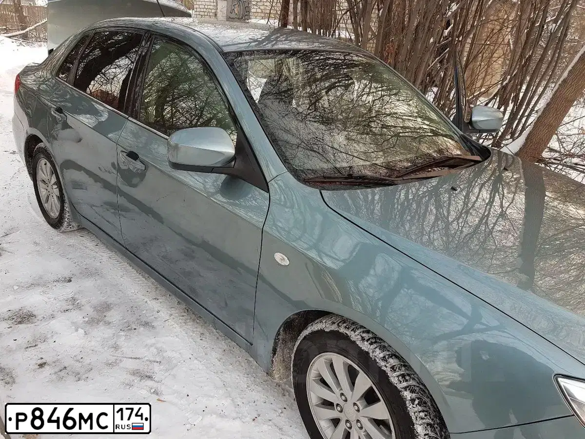 Фото автомобиля SUBARU IMPREZA, 2008 — госномер К601ЕТ186. Цвет: ЗЕЛЕНЫЙ