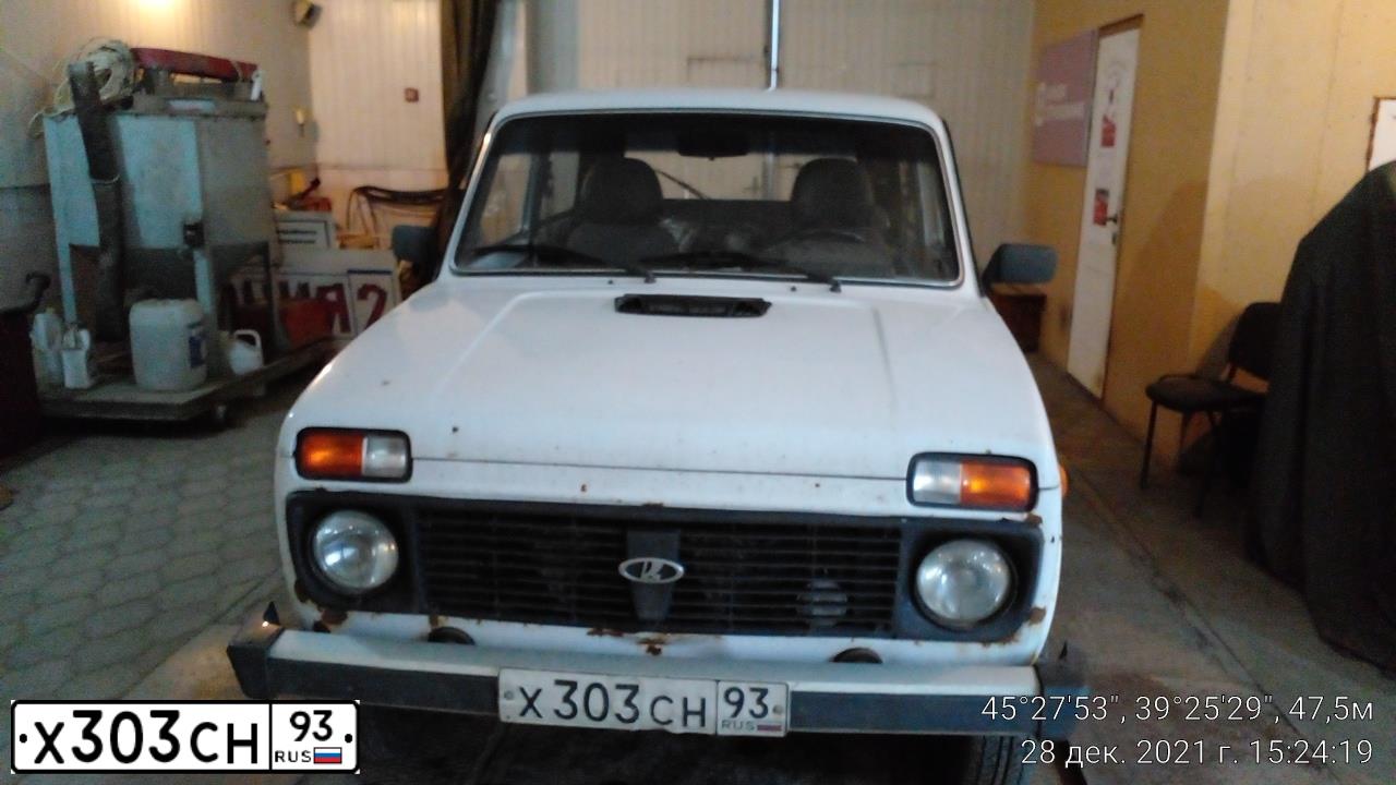 Фото автомобиля LADA 2121 NIVA, 2009 — госномер Х303СН93. Цвет: ЯРКО-БЕЛЫЙ