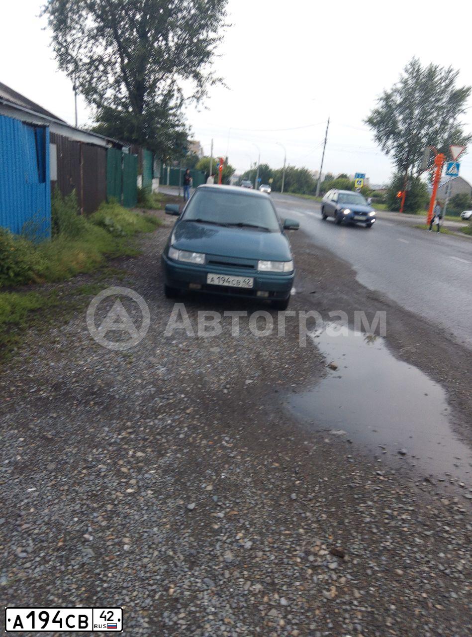 Фото автомобиля LADA 2112 LADA, 2007 — госномер А194СВ42. Цвет: Темно-зеленый