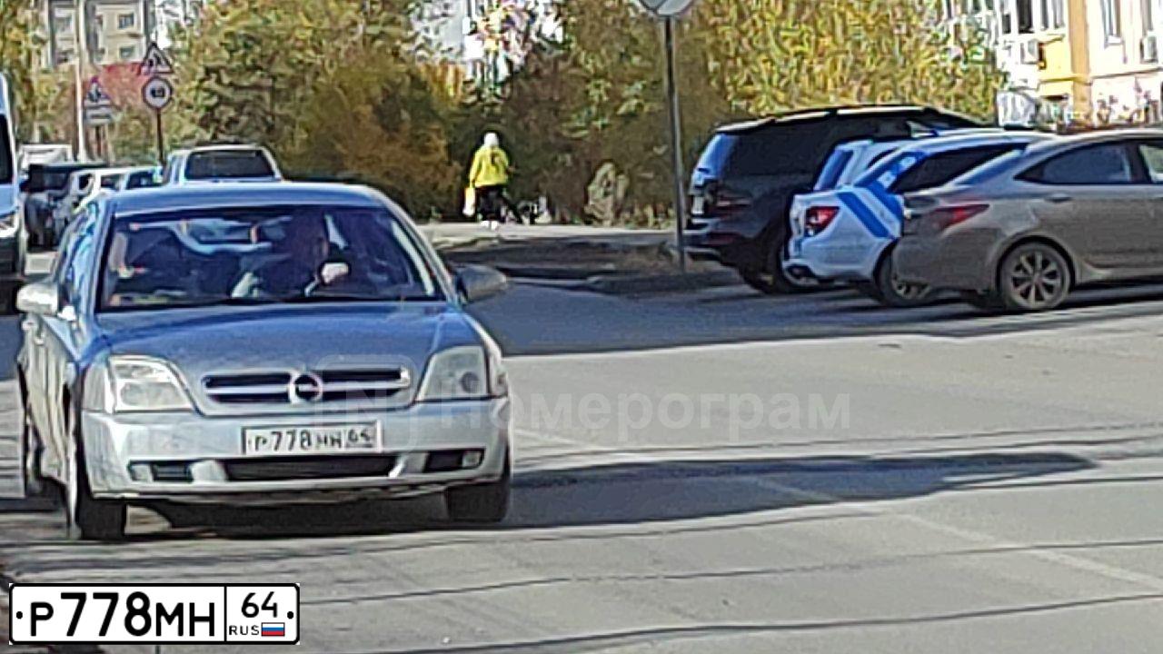 Фото автомобиля LADA 2112 LADA, 2007 — госномер М716КУ164. Цвет: ЧЕРНЫЙ