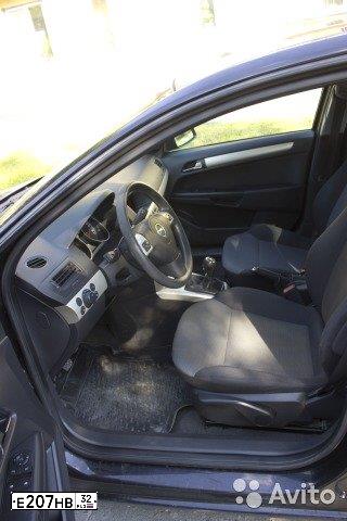 Фото автомобиля OPEL ASTRA, 2008 — госномер Е207НВ32. Цвет: ЧЕРНЫЙ