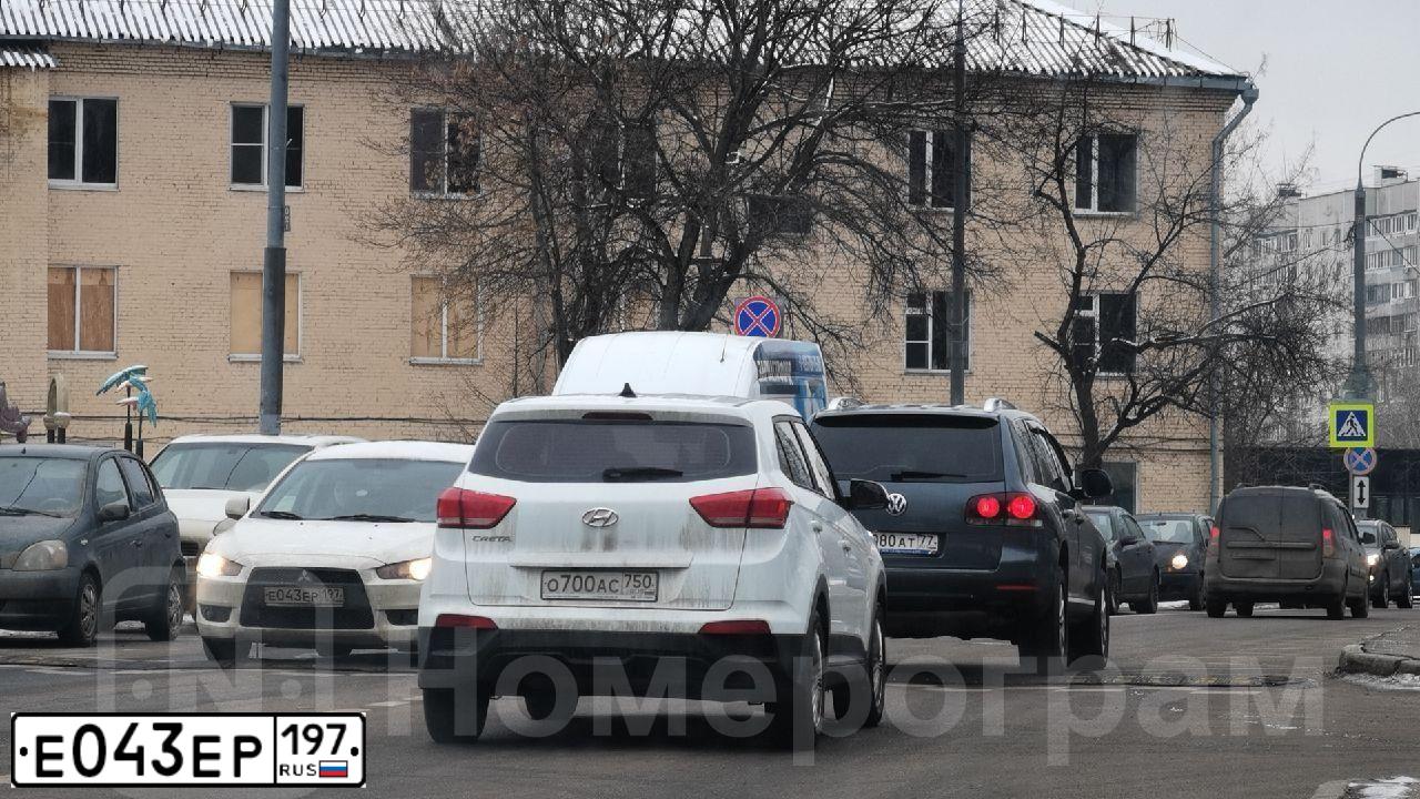 Фото автомобиля MITSUBISHI LANCER, 2010 — госномер О819СУ29. Цвет: Белый
