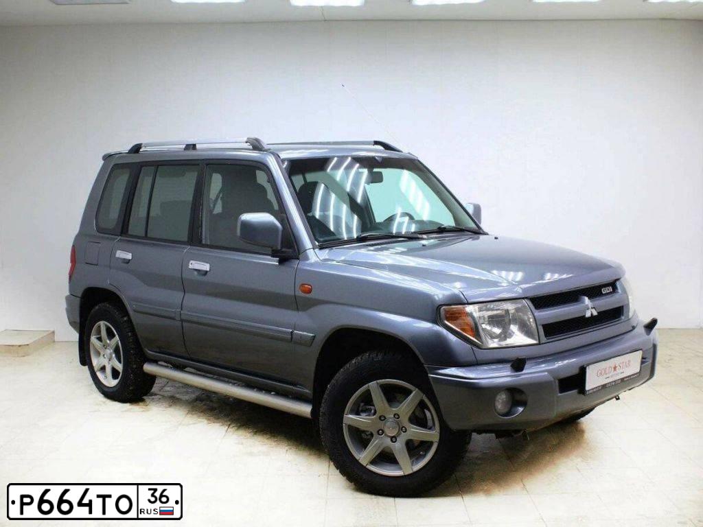 Фото автомобиля MITSUBISHI PAJERO PININ, 2004 — госномер М840ОК97. Цвет: СЕРЫЙ