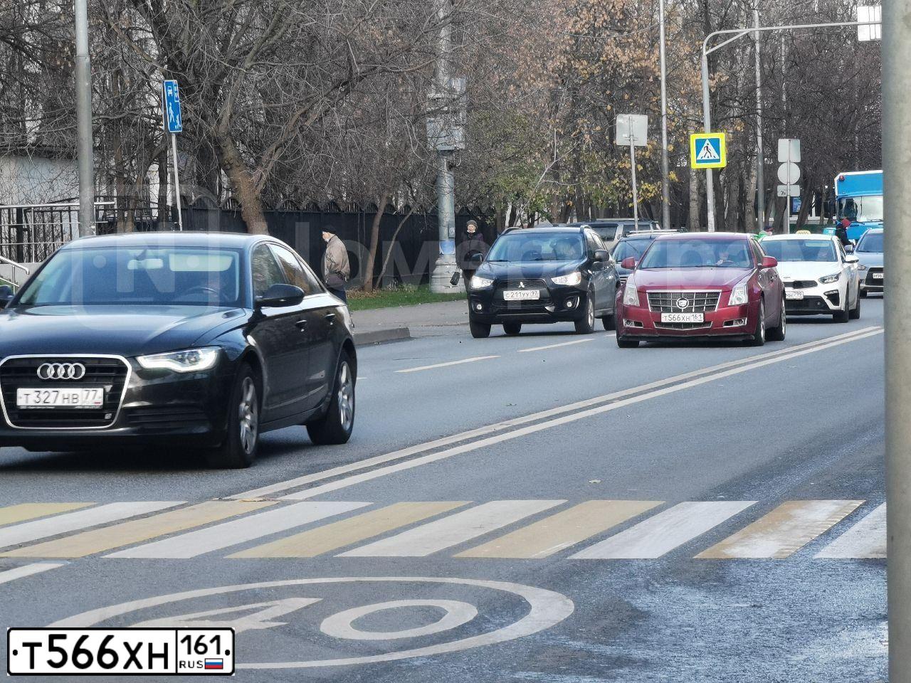 Фото автомобиля CADILLAC CTS, 2008 — госномер У317МЕ31. Цвет: Красный