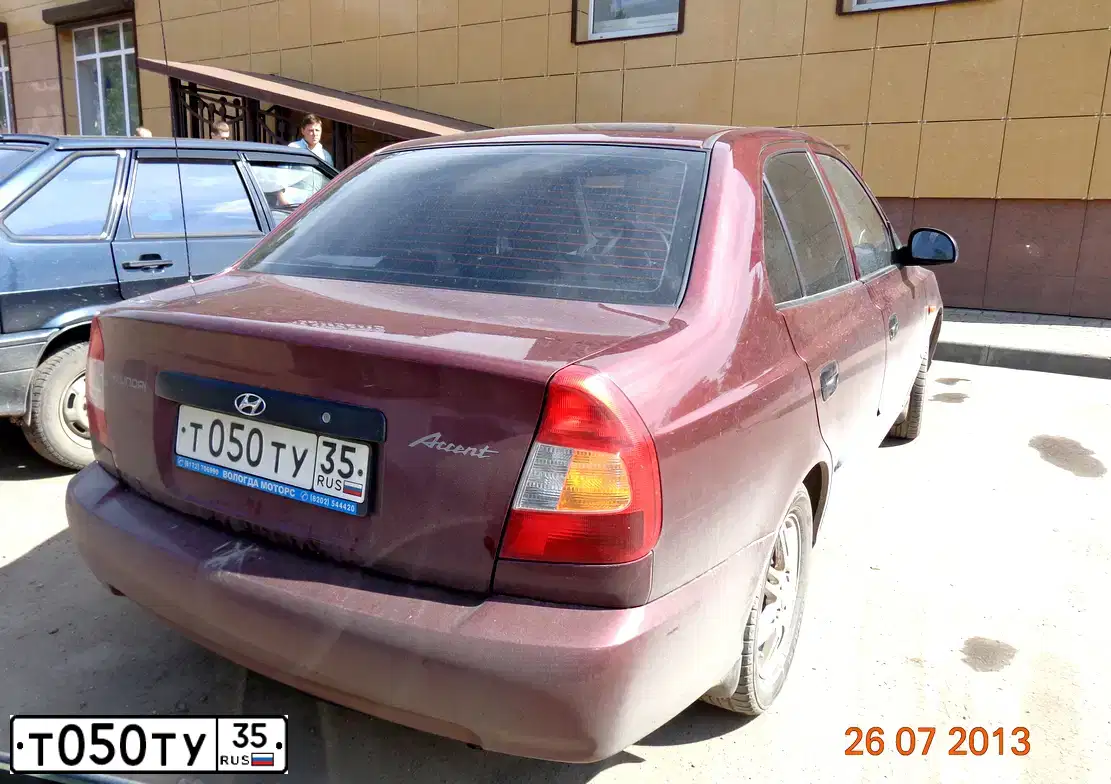 Фото автомобиля TAGAZ ACCENT, 2008 — госномер Е253КО35. Цвет: КРАСНЫЙ