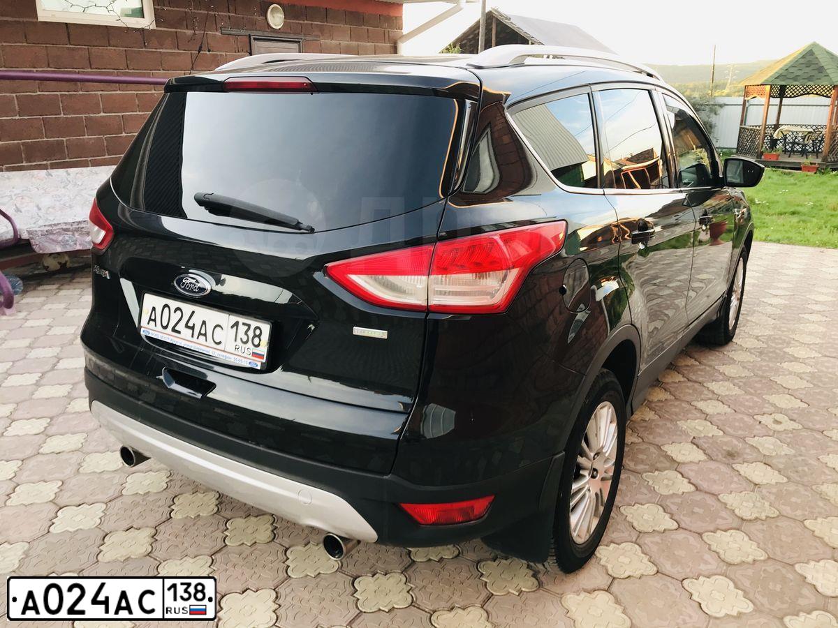 Фото автомобиля FORD KUGA, 2014 — госномер А024АС138. Цвет: ЧЕРНЫЙ