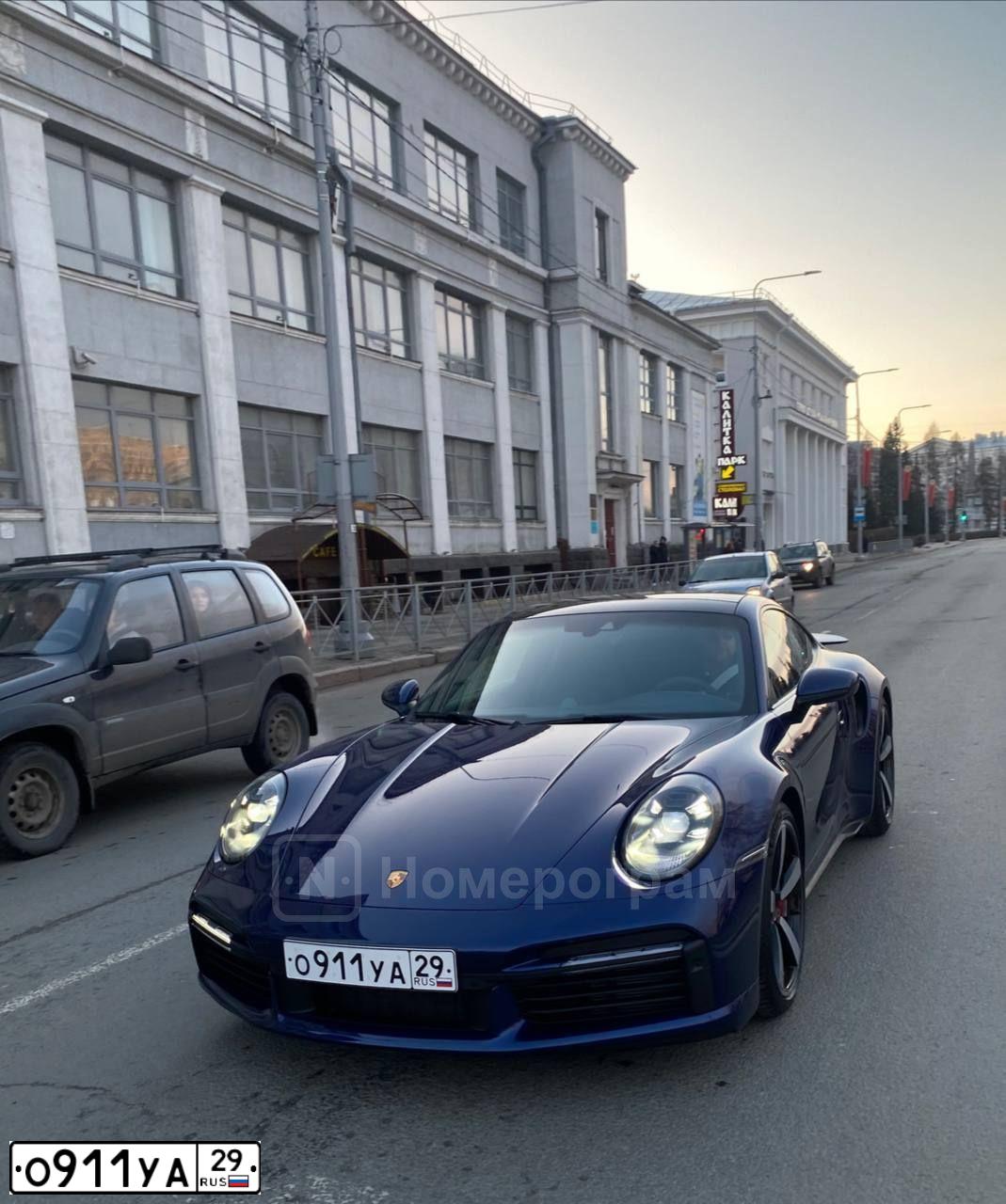 Фото автомобиля PORSCHE 911, 2021 — госномер О911УА29. Цвет: синий