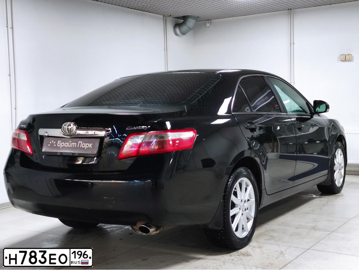 Фото автомобиля TOYOTA CAMRY, 2010 — госномер Н219ВХ750. Цвет: ЧЕРНЫЙ