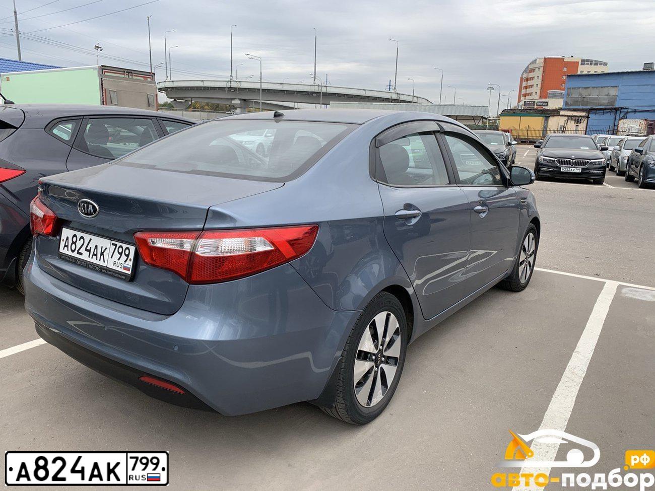 Фото автомобиля KIA RIO, 2012 — госномер Х102ТК33. Цвет: голубой