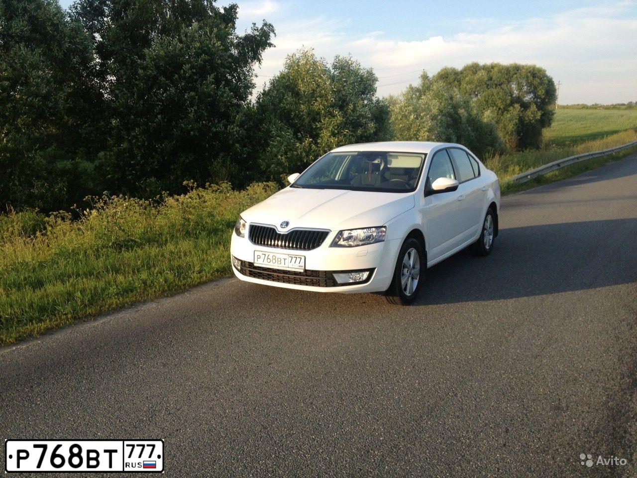 Фото автомобиля SKODA OCTAVIA, 2014 — госномер Т856НМ31. Цвет: Белый