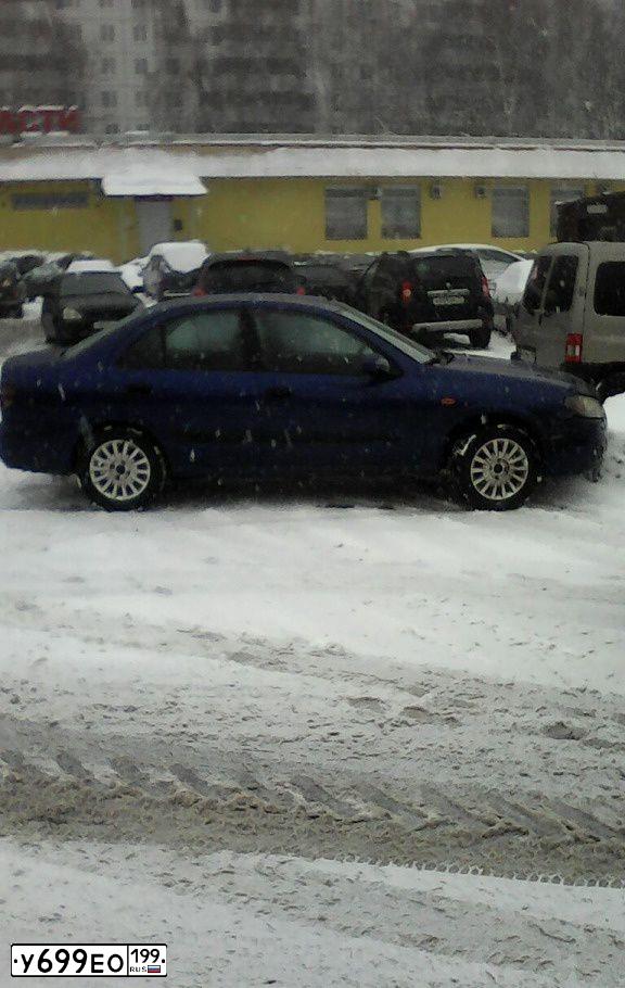 Фото автомобиля NISSAN ALMERA, 2004 — госномер Н585РВ97. Цвет: СИНИЙ ТЕМНЫЙ
