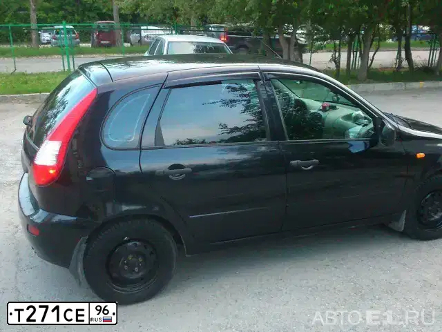 Фото автомобиля LADA 1119 KALINA, 2011 — госномер Т271СЕ96. Цвет: Сине-Черный