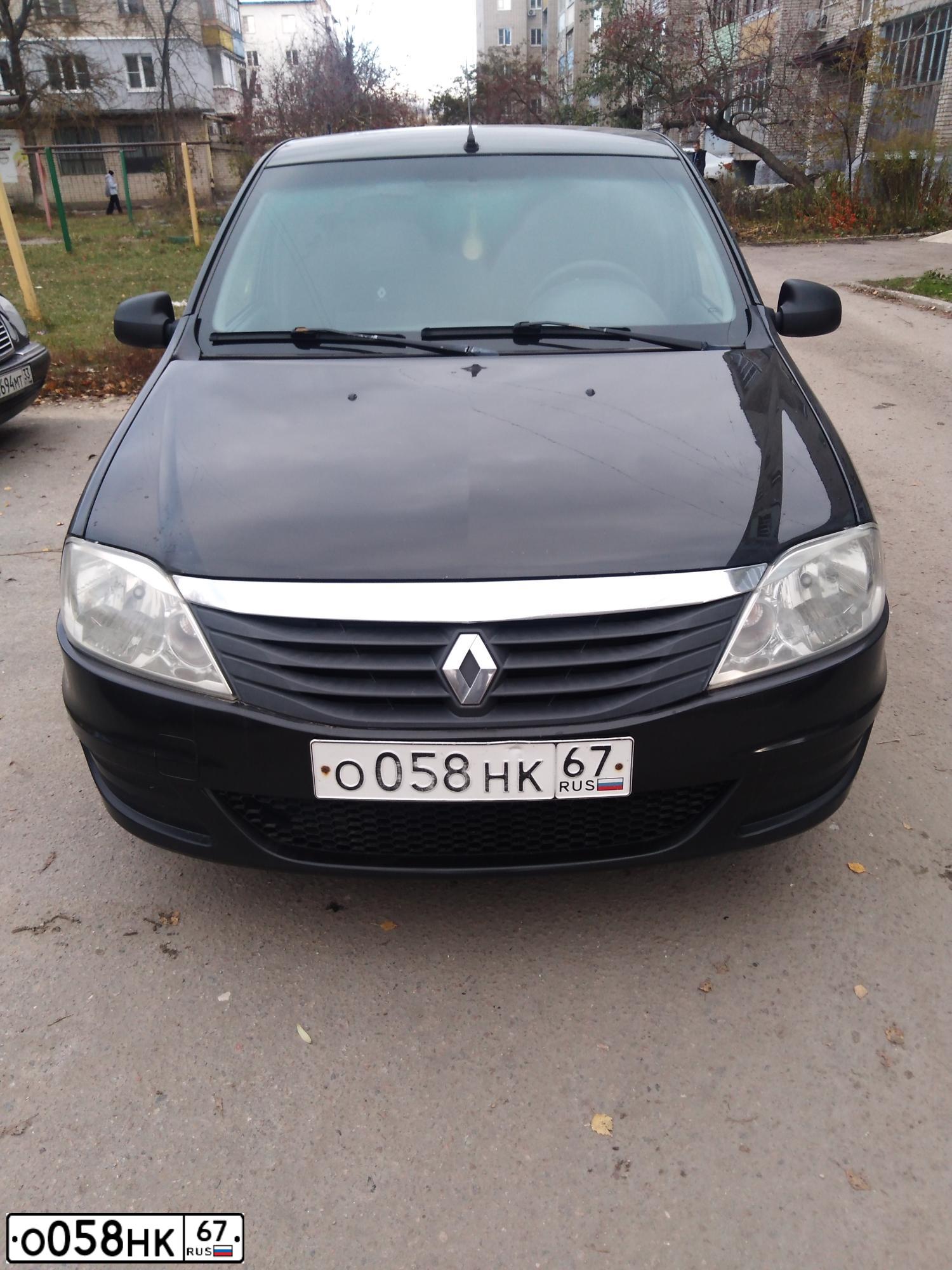 Фото автомобиля RENAULT LOGAN, 2012 — госномер О058НК67. Цвет: ЧЕРНЫЙ
