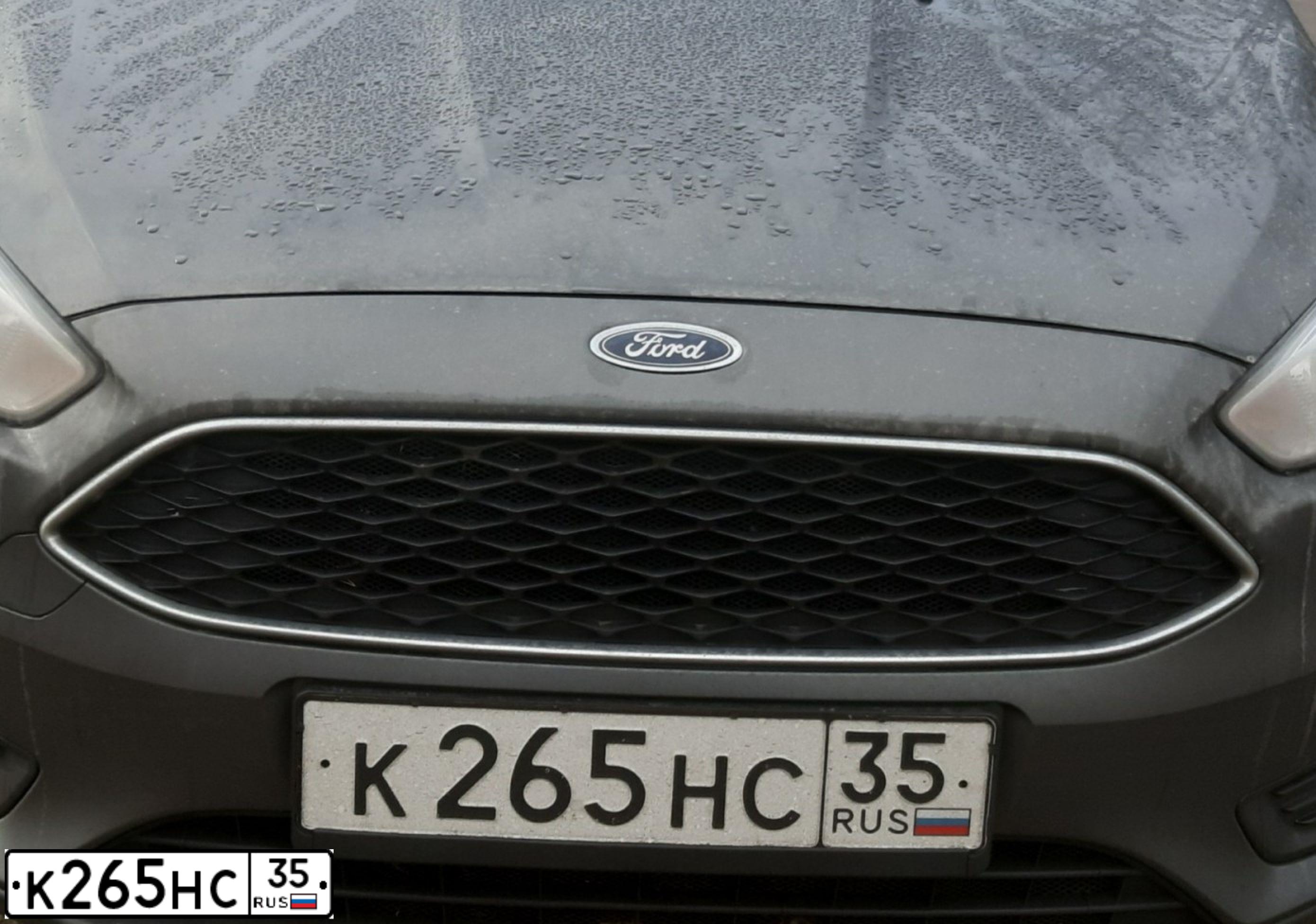 Фото автомобиля FORD FOCUS, 2015 — госномер О527ВА32. Цвет: СЕРЫЙ