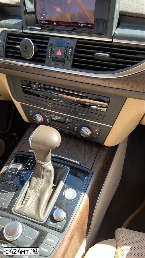 Фото автомобиля AUDI A6, 2012 — госномер Т651АЕ977. Цвет: СЕРО-КОРИЧНЕВЫЙ
