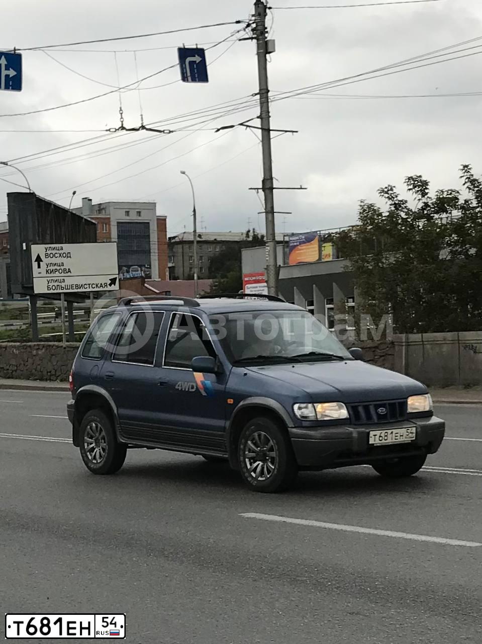 Фото автомобиля KIA SPORTAGE, 2005 — госномер Т681ЕН54. Цвет: СИНИЙ
