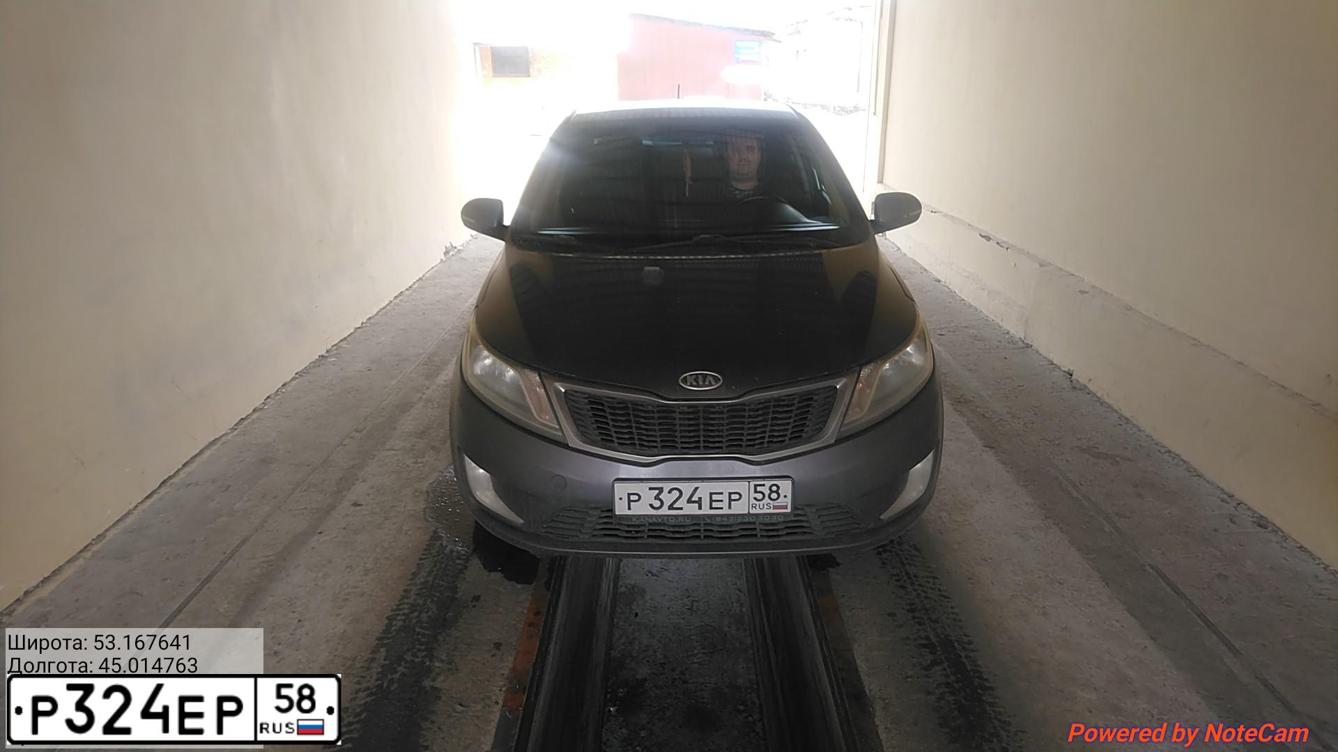 Фото автомобиля KIA RIO, 2013 — госномер Р324ЕР58. Цвет: СЕРЫЙ