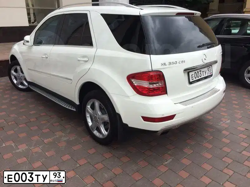 Фото автомобиля CHEVROLET CRUZE, 2011 — госномер Е003ТУ93. Цвет: Белый