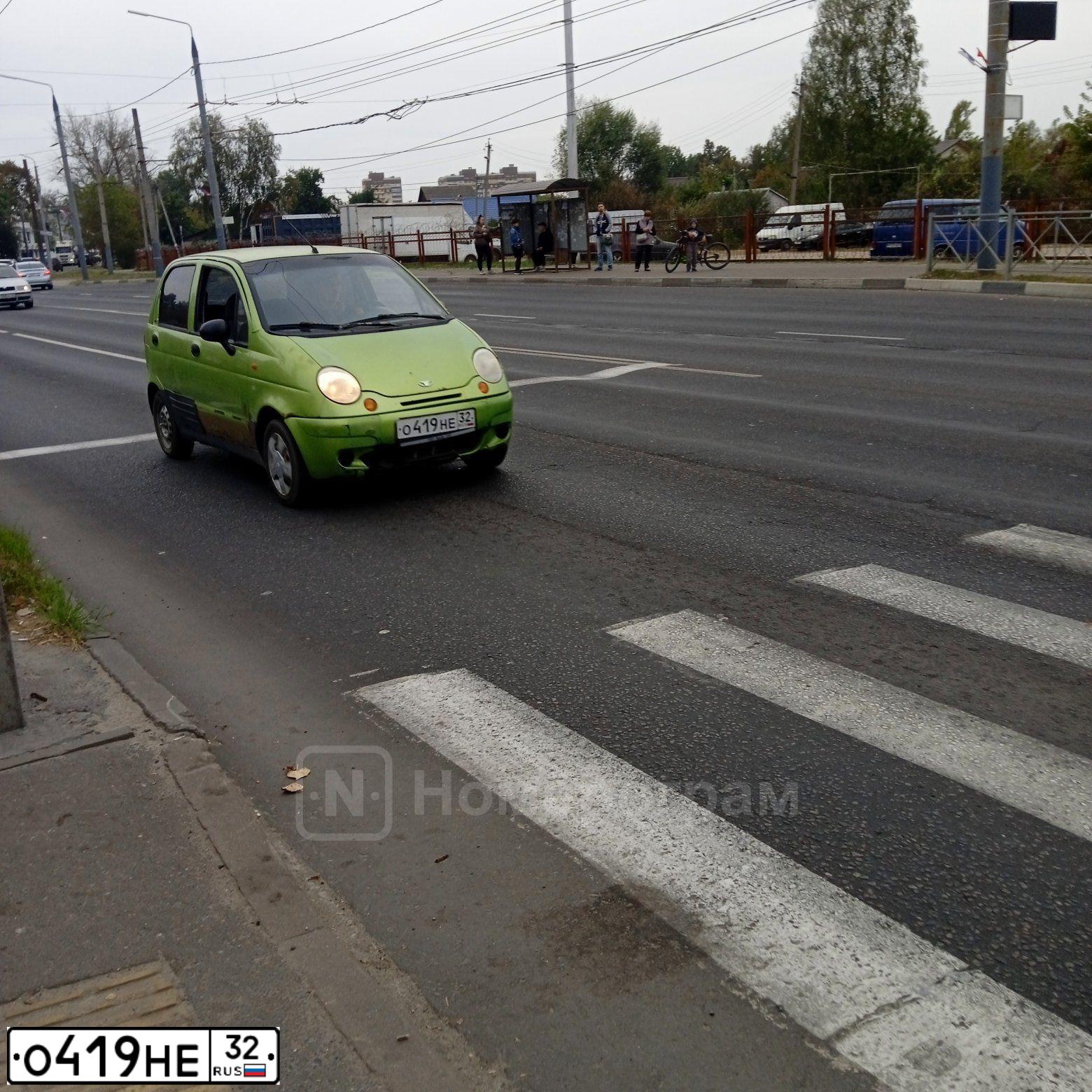 Фото автомобиля DAEWOO MATIZ, 2006 — госномер О419НЕ32. Цвет: ЯРКО-САЛАТОВЫЙ