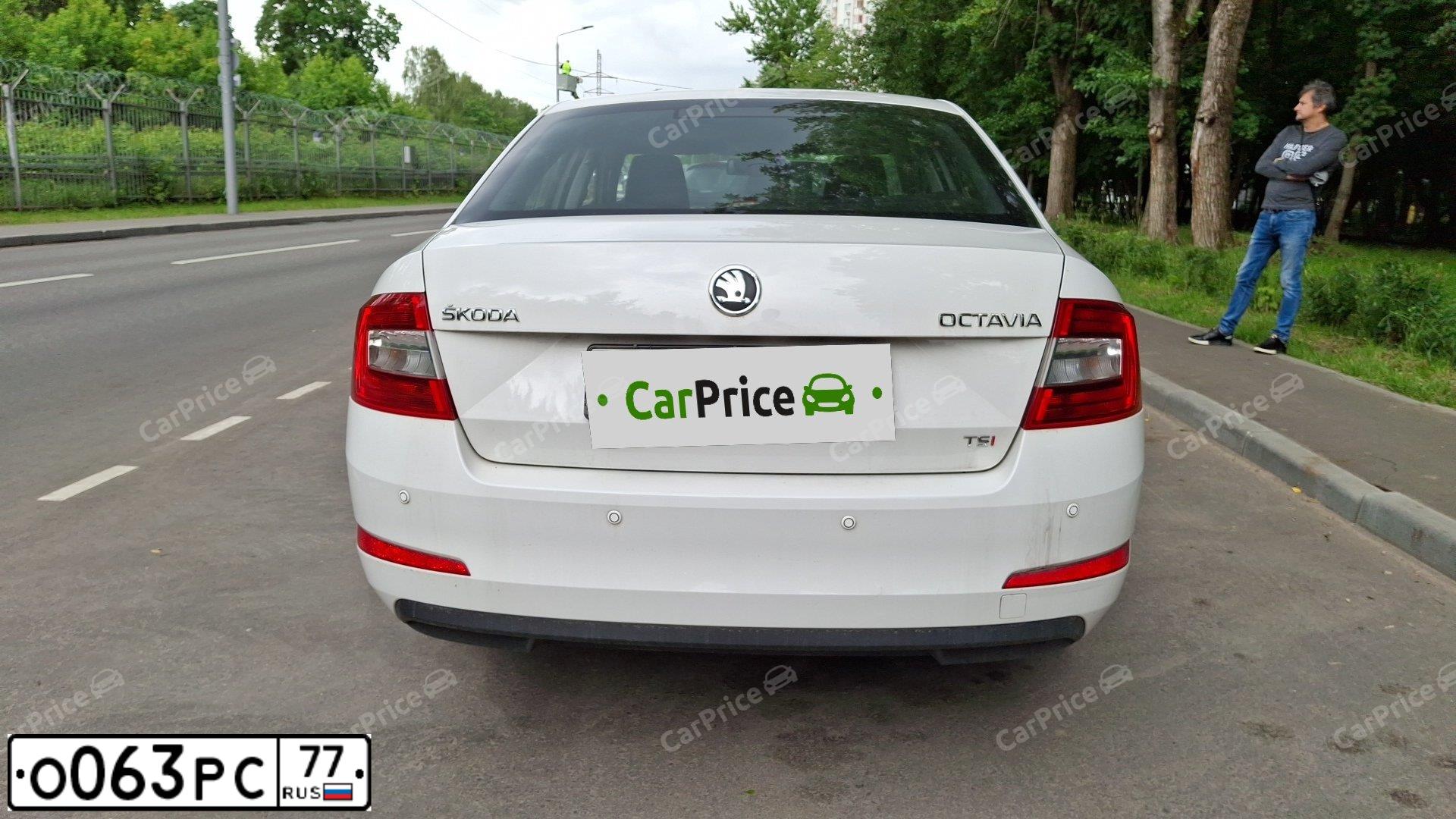 Фото автомобиля SKODA OCTAVIA, 2013 — госномер О063РС77. Цвет: БЕЛЫЙ