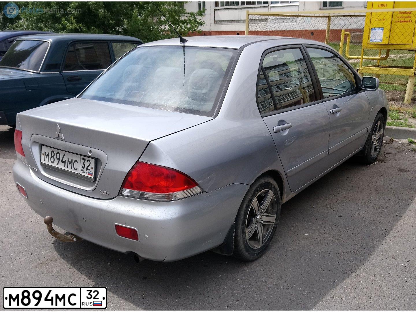 Фото автомобиля MITSUBISHI LANCER, 2004 — госномер О277АУ32. Цвет: Серебристый