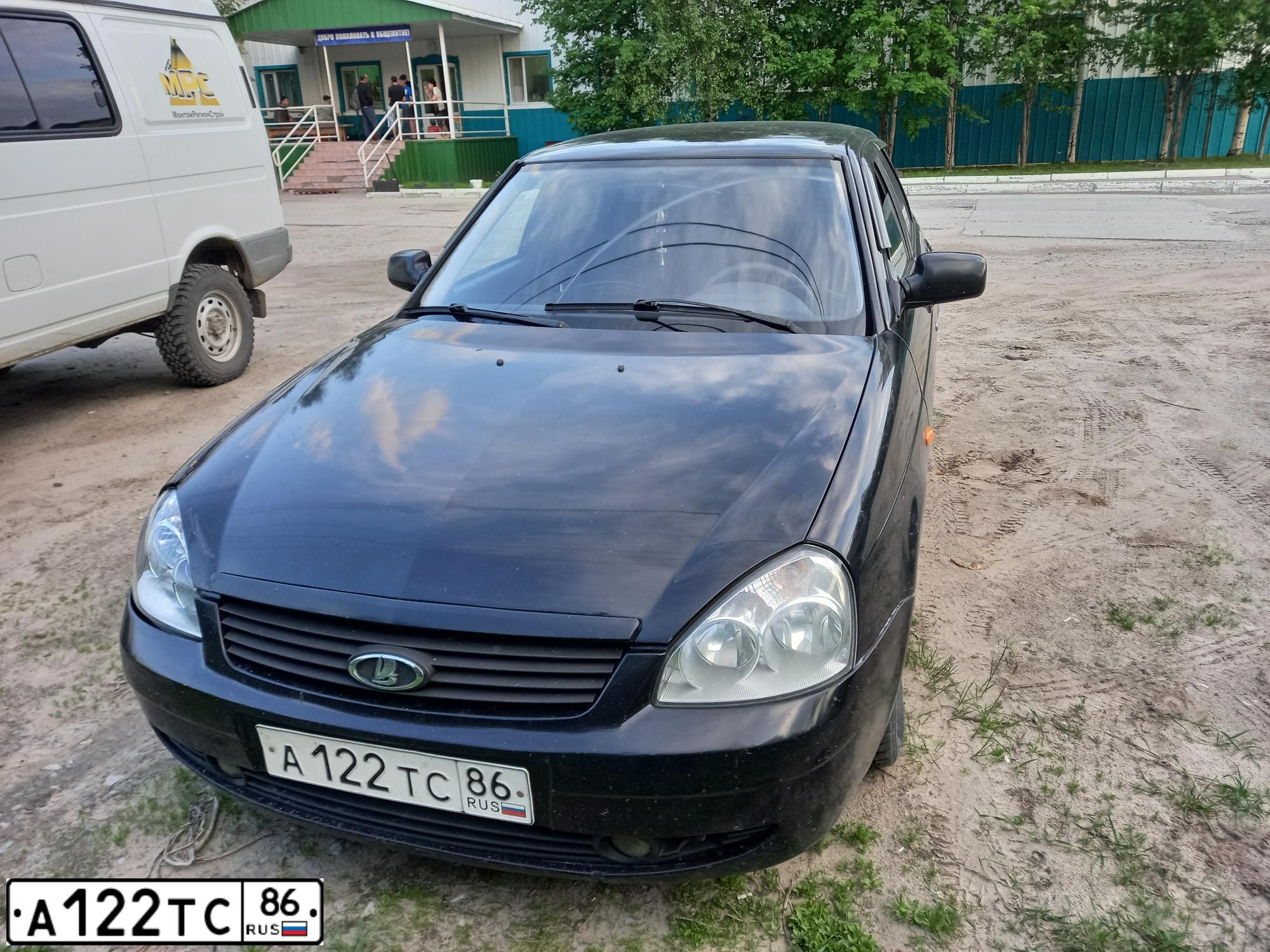 Фото автомобиля LADA 2172 PRIORA, 2009 — госномер М404ВТ774. Цвет: Темно-зеленый