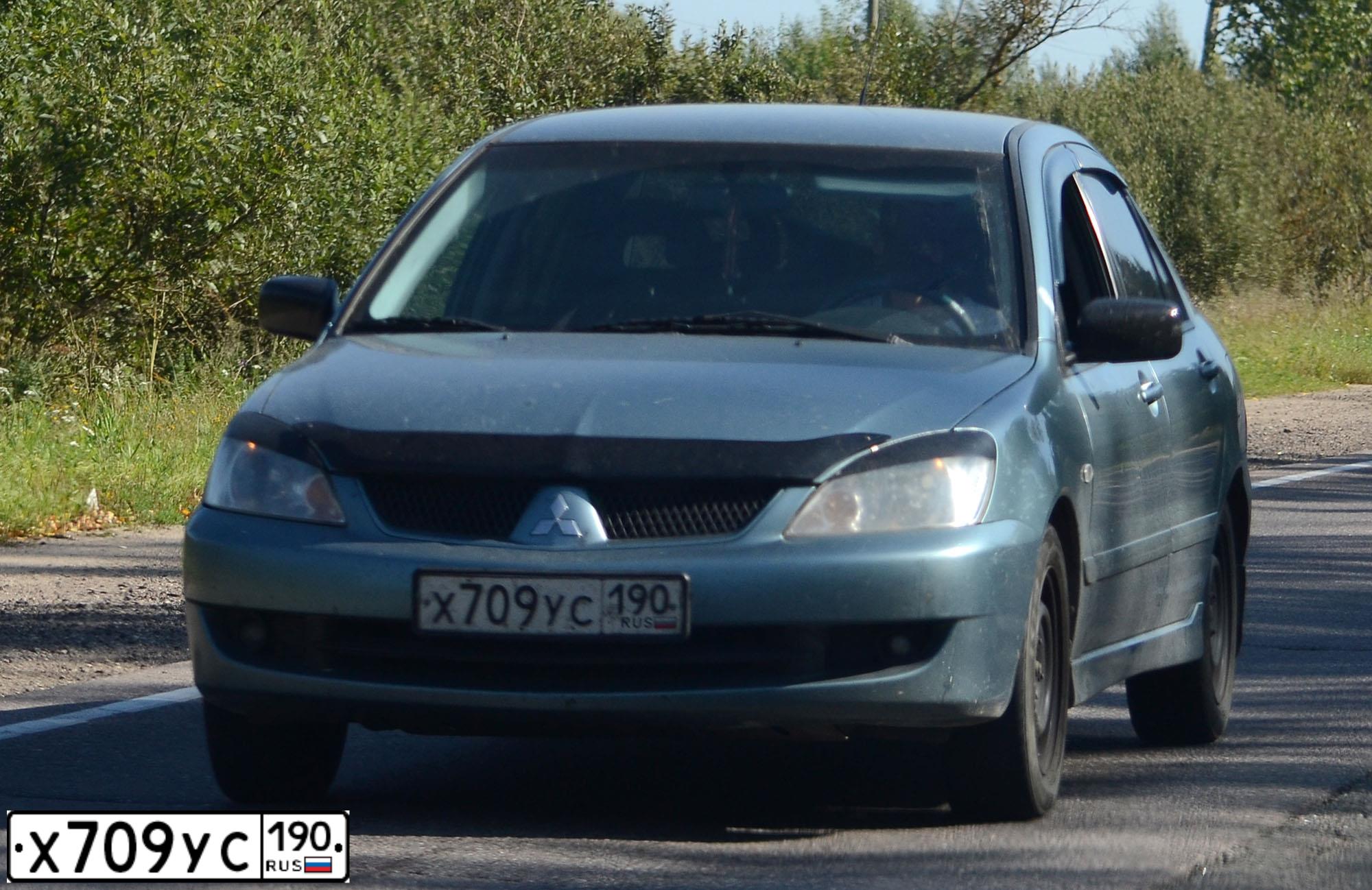 Фото автомобиля MITSUBISHI LANCER, 2005 — госномер Н761ВК57. Цвет: СВЕТЛО-СЕРО-ЗЕЛЕНЫЙ