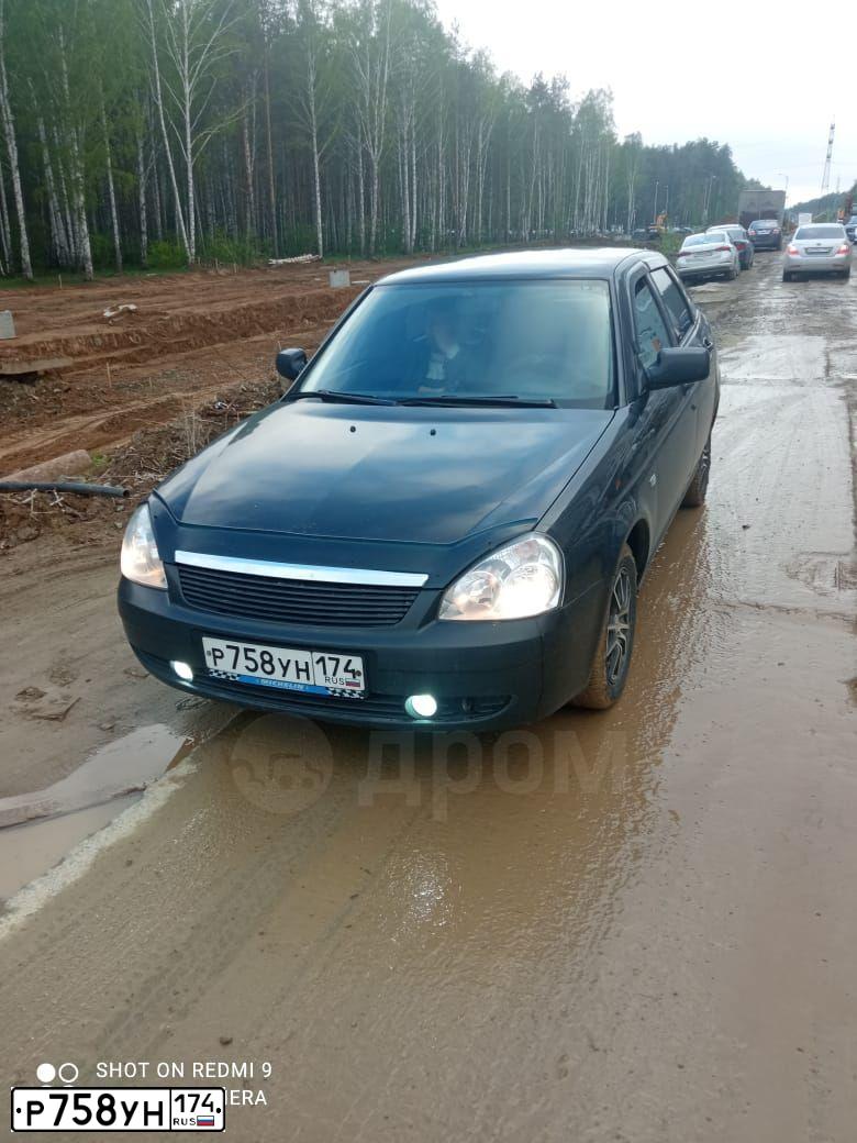Фото автомобиля LADA 2172 PRIORA, 2008 — госномер С202КР174. Цвет: Темно-зеленый