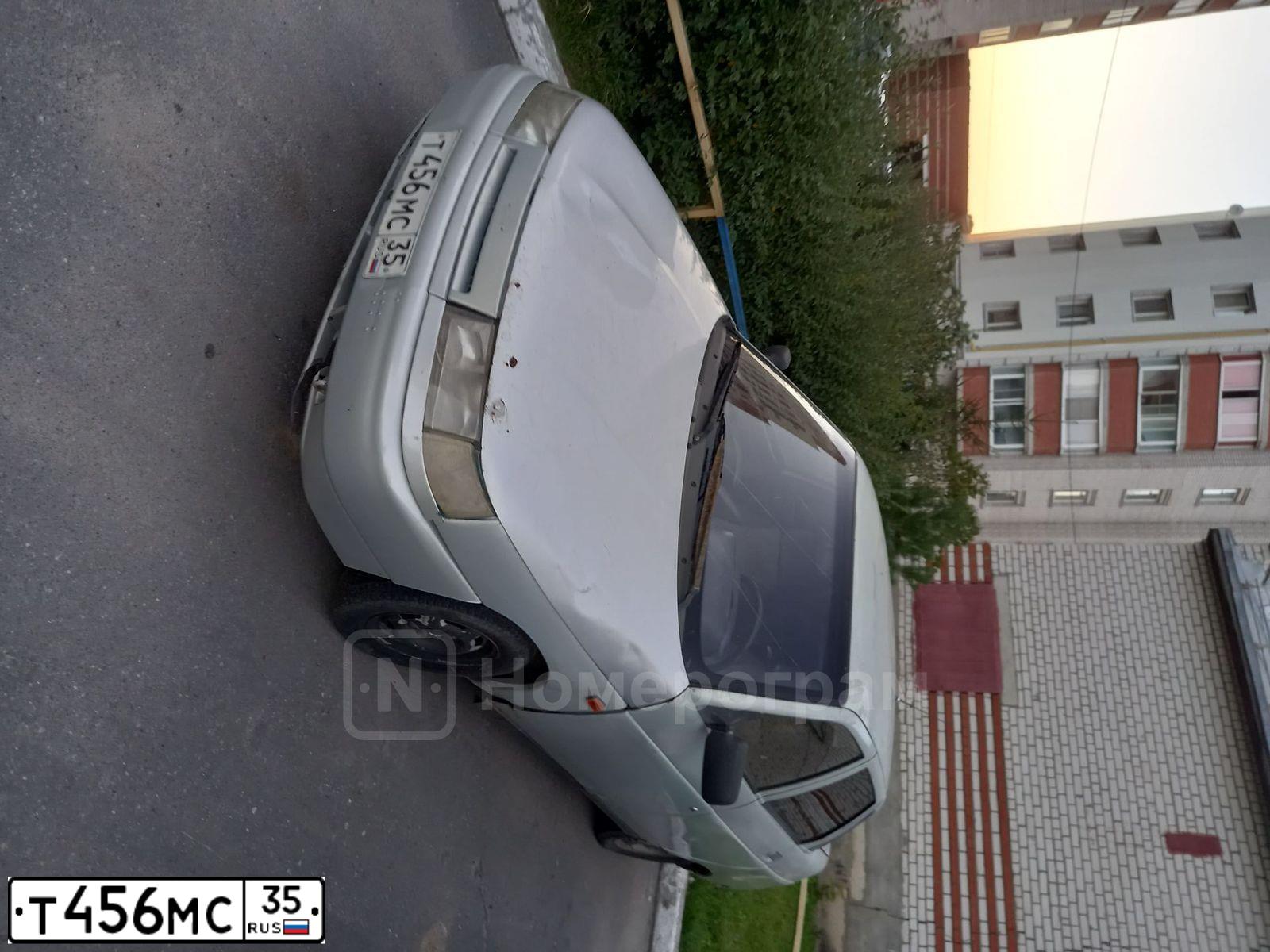 Фото автомобиля LADA 2110, 2003 — госномер Р294ВУ29. Цвет: СЕРЕБРИСТЫЙ ЖЕЛТО-ЗЕЛЕНЫЙ