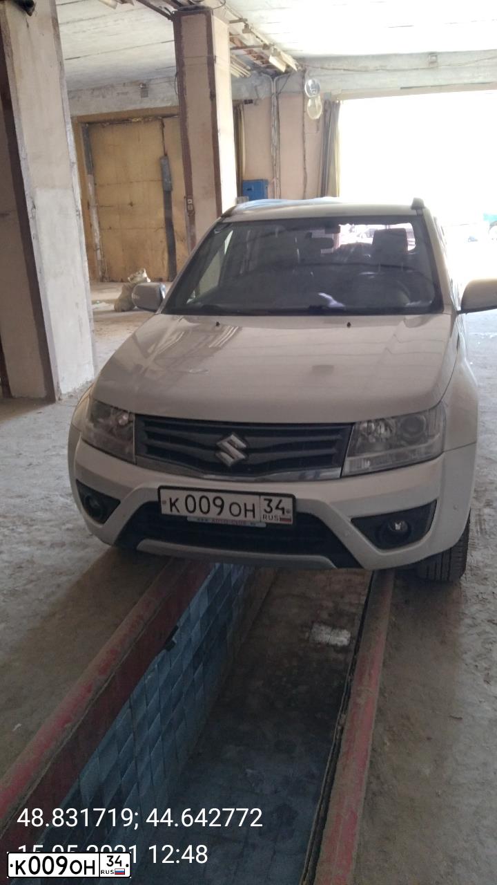 Фото автомобиля TOYOTA COROLLA, 2005 — госномер К009ОН34. Цвет: ЧЕРНЫЙ