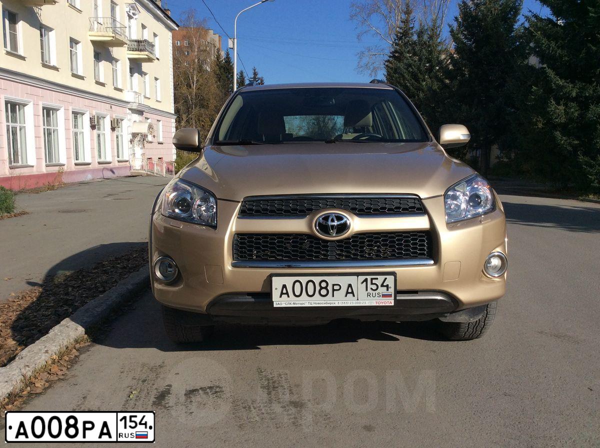 Фото автомобиля TOYOTA RAV4, 2011 — госномер Е970ХМ154. Цвет: БЕЖЕВЫЙ