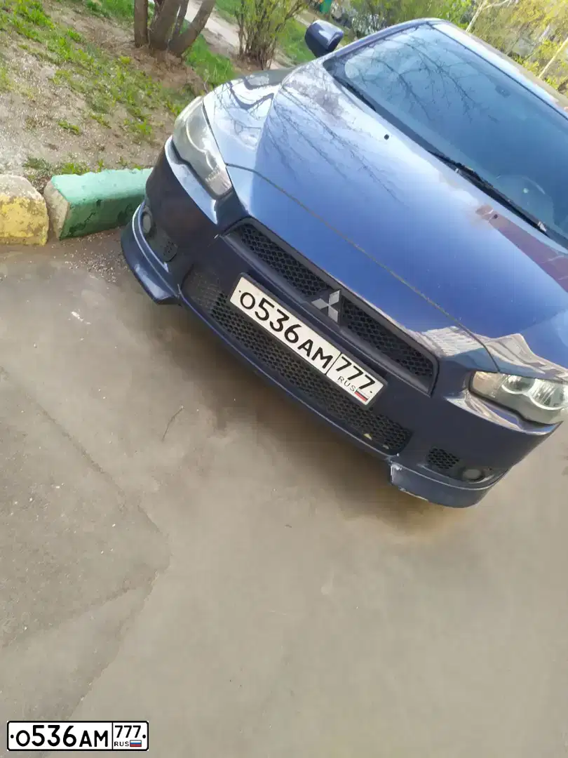 Фото автомобиля MITSUBISHI LANCER, 2007 — госномер О536АМ777. Цвет: СИНИЙ