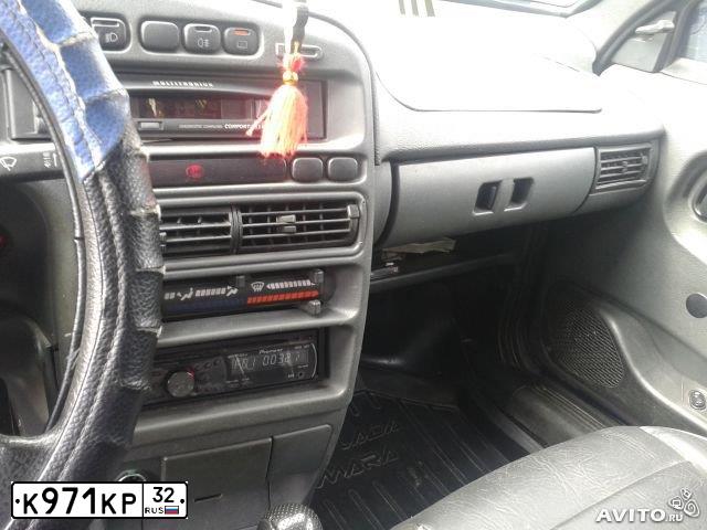 Фото автомобиля LADA 2114 SAMARA, 2004 — госномер М112ОТ67. Цвет: сине-зеленый