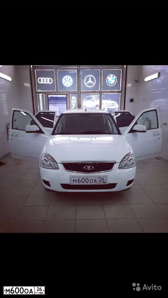 Фото автомобиля LADA LARGUS, 2021 — госномер Н155ТТ126. Цвет: СЕРЫЙ