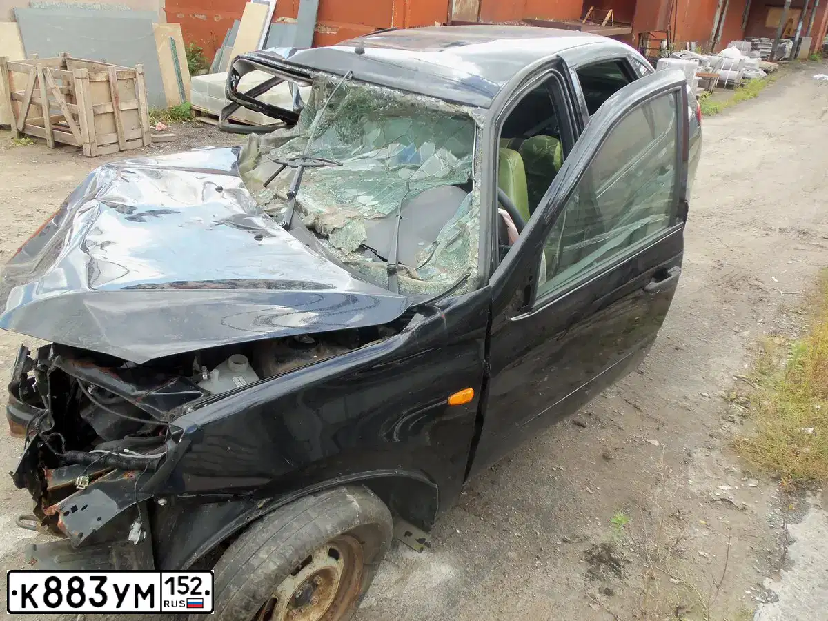Фото автомобиля LADA 2190 GRANTA, 2013 — госномер К883УМ152. Цвет: Сине-Черный
