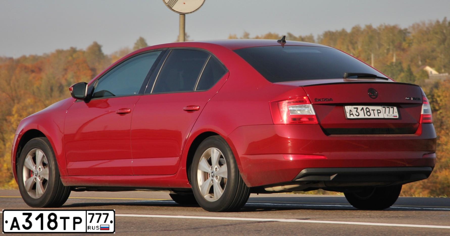 Фото автомобиля SKODA OCTAVIA, 2016 — госномер А318ТР777. Цвет: ВИШНЕВЫЙ