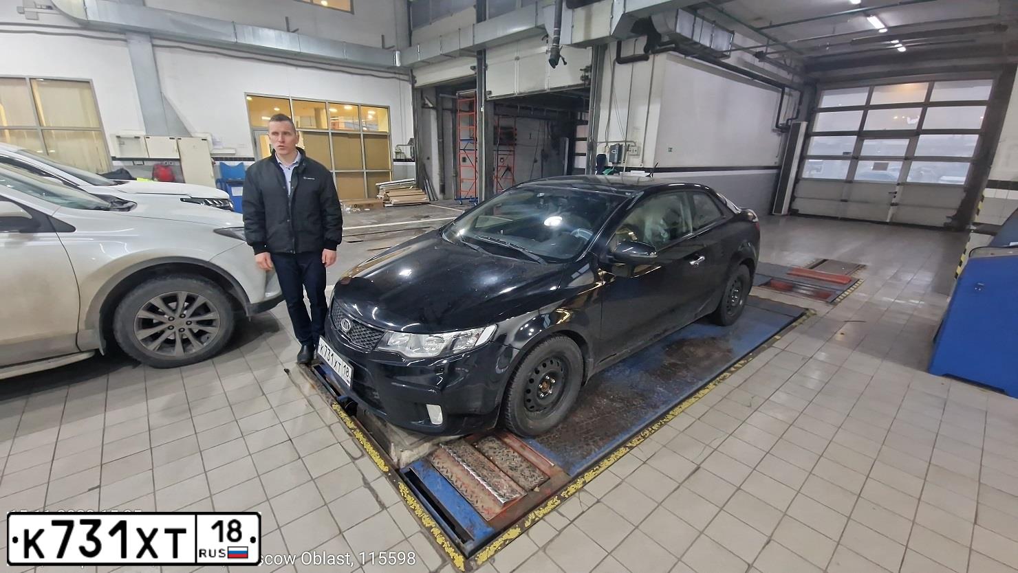 Фото автомобиля KIA CERATO, 2011 — госномер Е985НХ197. Цвет: ЧЕРНЫЙ