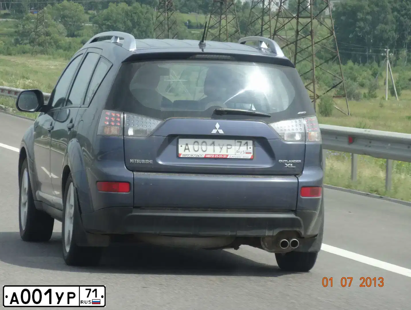 Фото автомобиля MITSUBISHI OUTLANDER, 2007 — госномер А001УР71. Цвет: синий