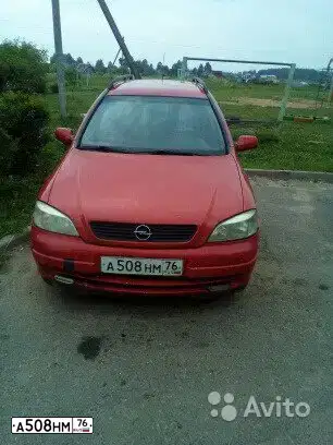 Фото автомобиля OPEL ASTRA, 1998 — госномер А508НМ76. Цвет: Красный