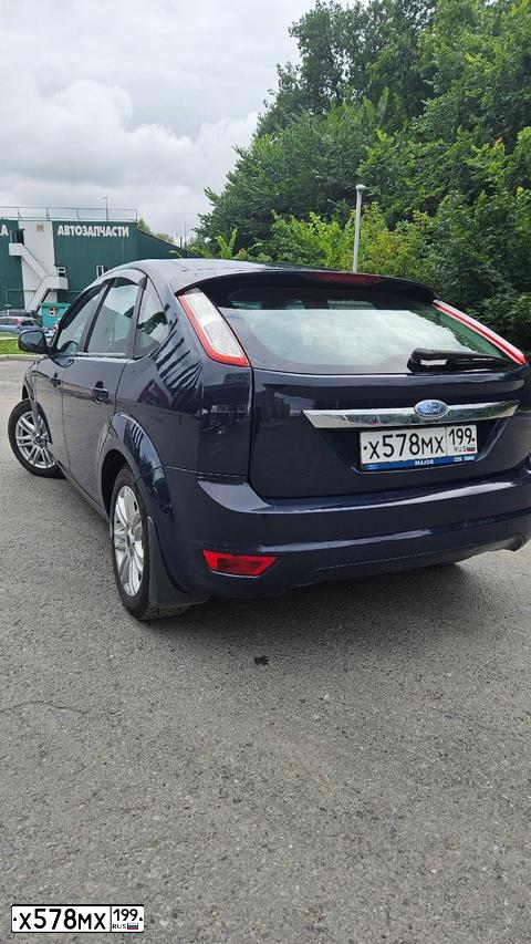 Фото автомобиля FORD FOCUS, 2008 — госномер Н335СМ702. Цвет: Темно-синий
